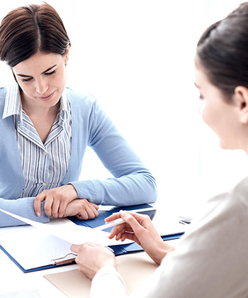 two women in a meeting