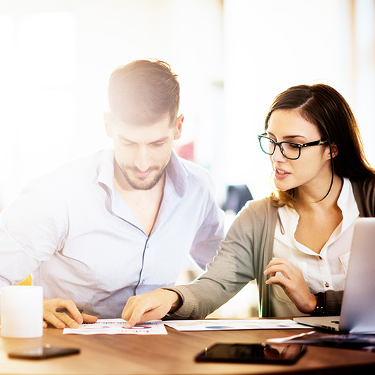 two colleagues working together
