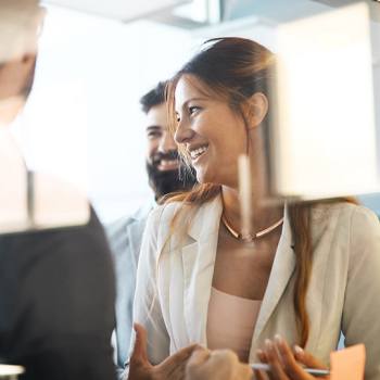Groupe Kyocera woman smiling in meeting