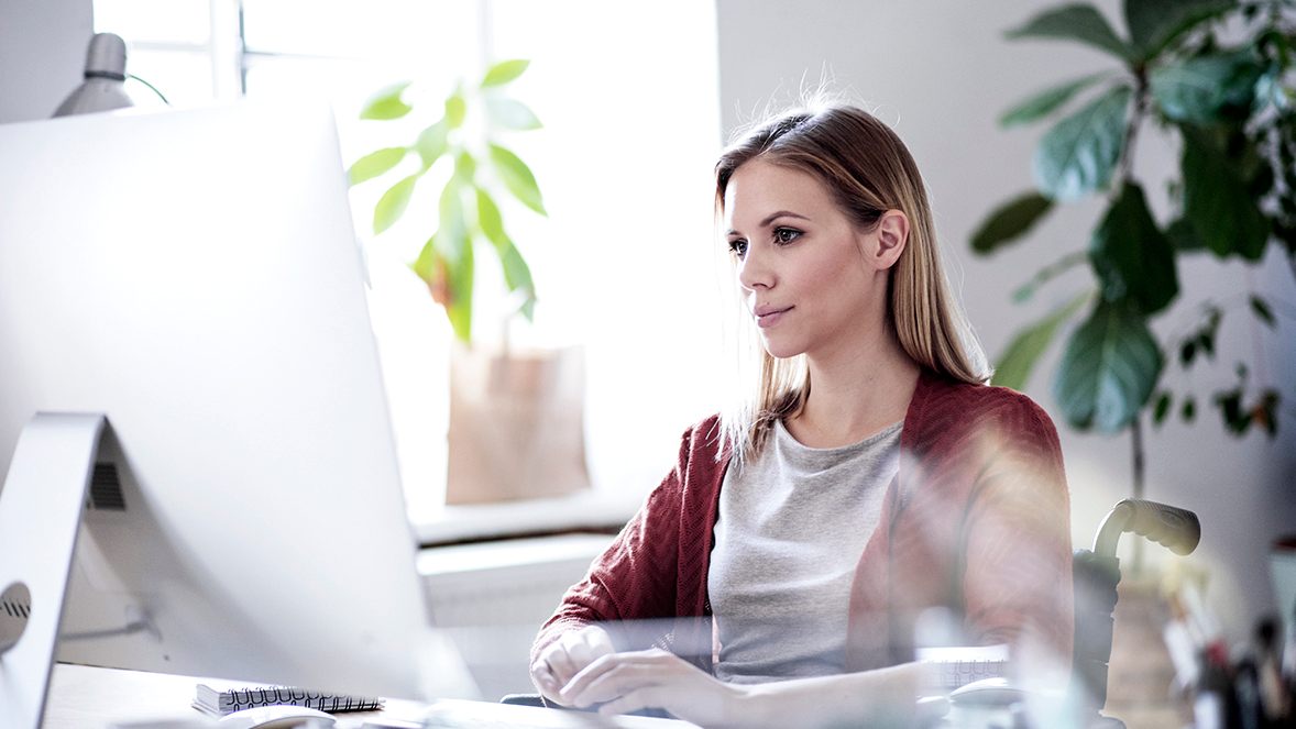 Lady looking at laptop Lady looking at laptop