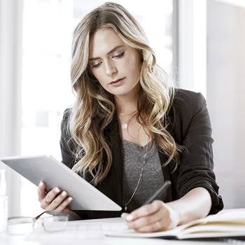 woman working with her tablet