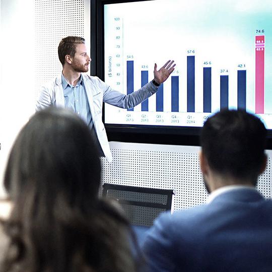 The smart choice for dynamic workspaces man presenting data
